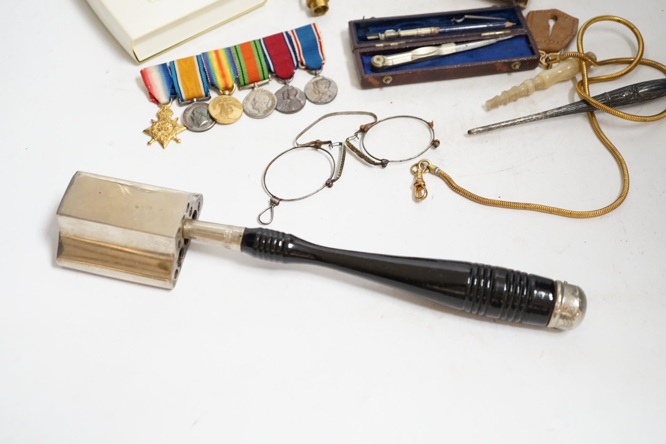 A group of mixed collectables including a gilt metal and turquoise posy holder, silver mounted shaving brush and miniature leather cased drawing set. Condition - varies